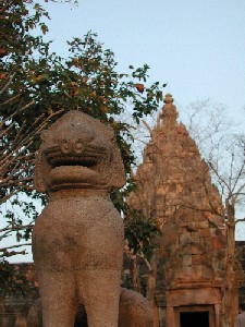 A Lion Statue Standing Before Phnom Rung