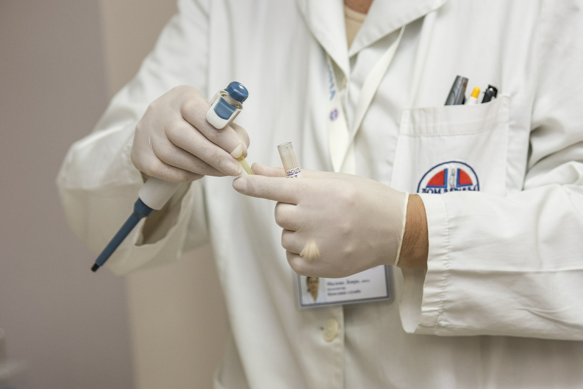 A doctor holding a test tube